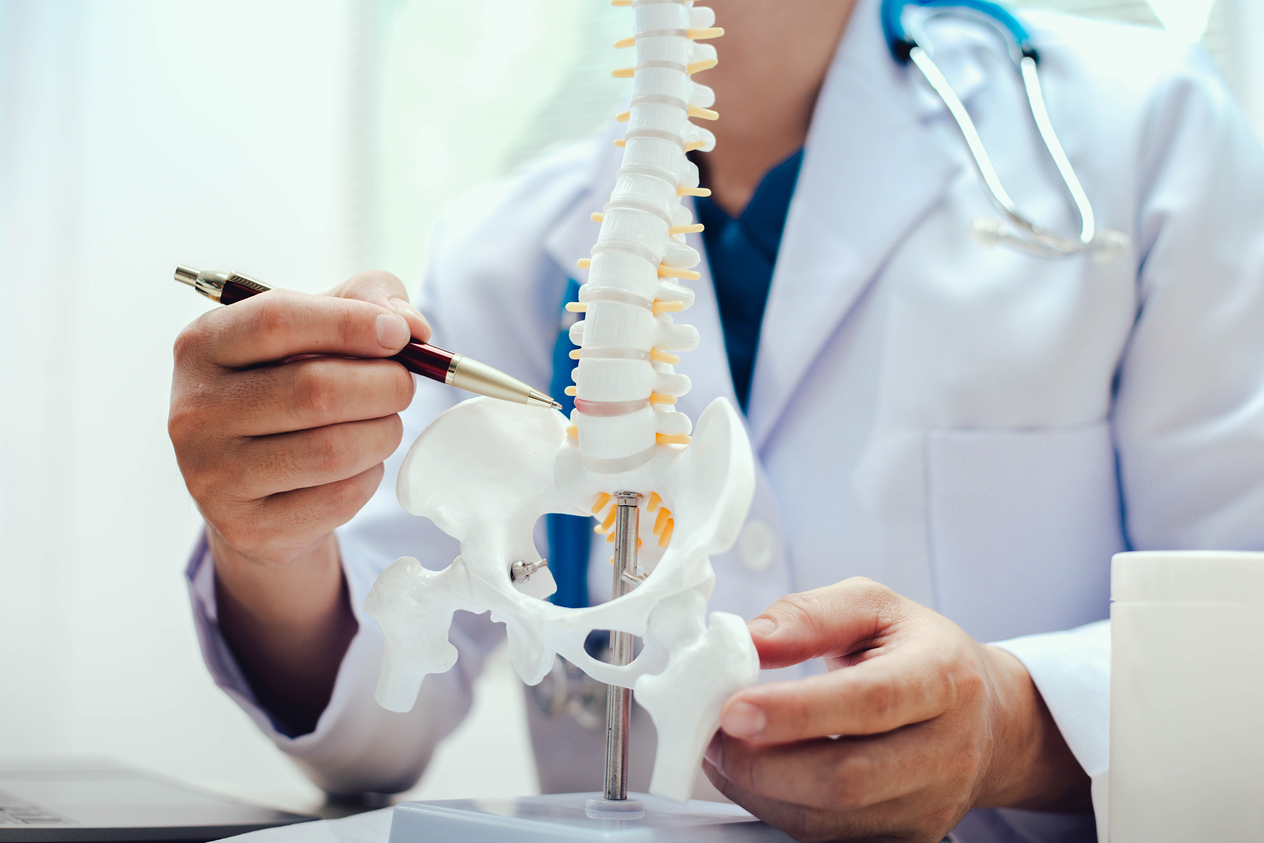 Chiropractor adjusting a patient